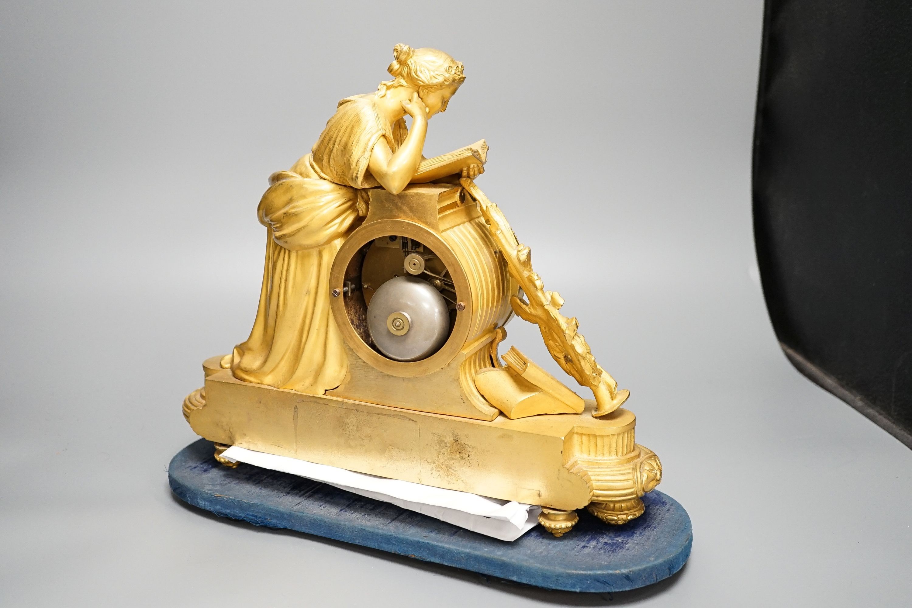 A French ormolu and porcelain mounted figural mantel clock 35cm